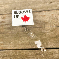 Elbows Up Badge Reel